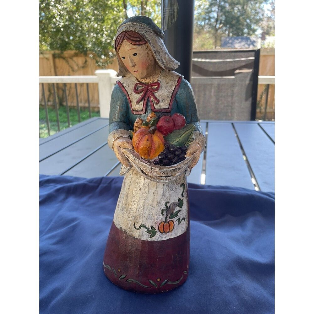 Carved Pilgrim Woman Figurine